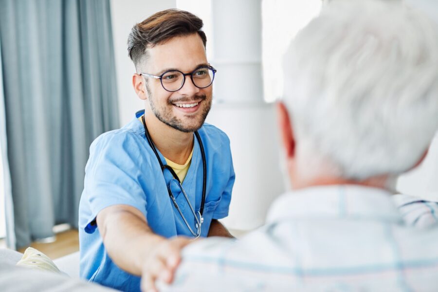A doctor greeting a patient