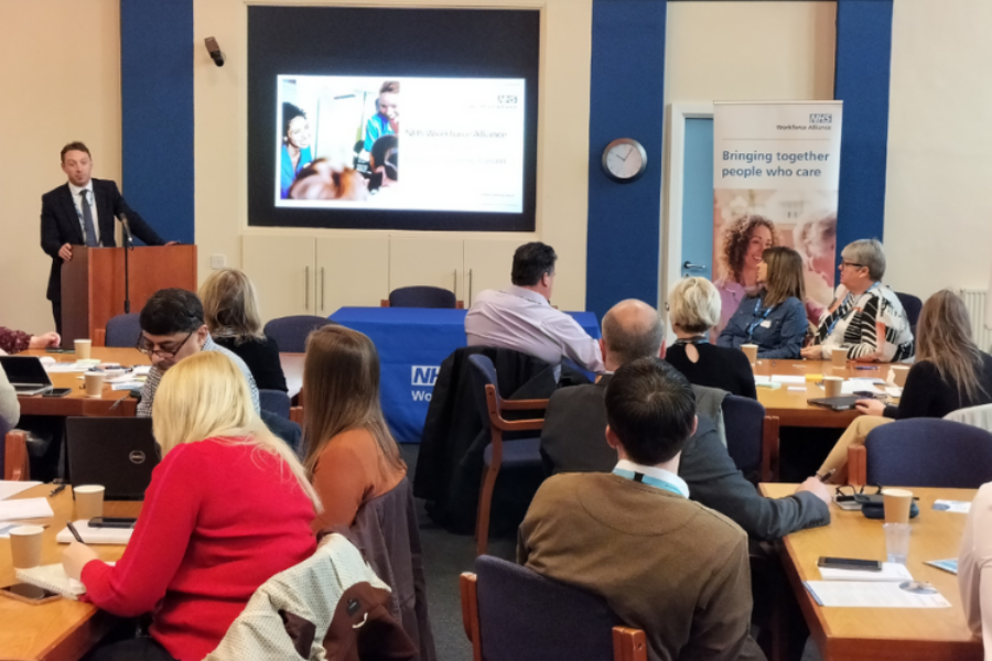 General view of David Downey speaking to attendees of the East of England Nursing Forum in Cambridge